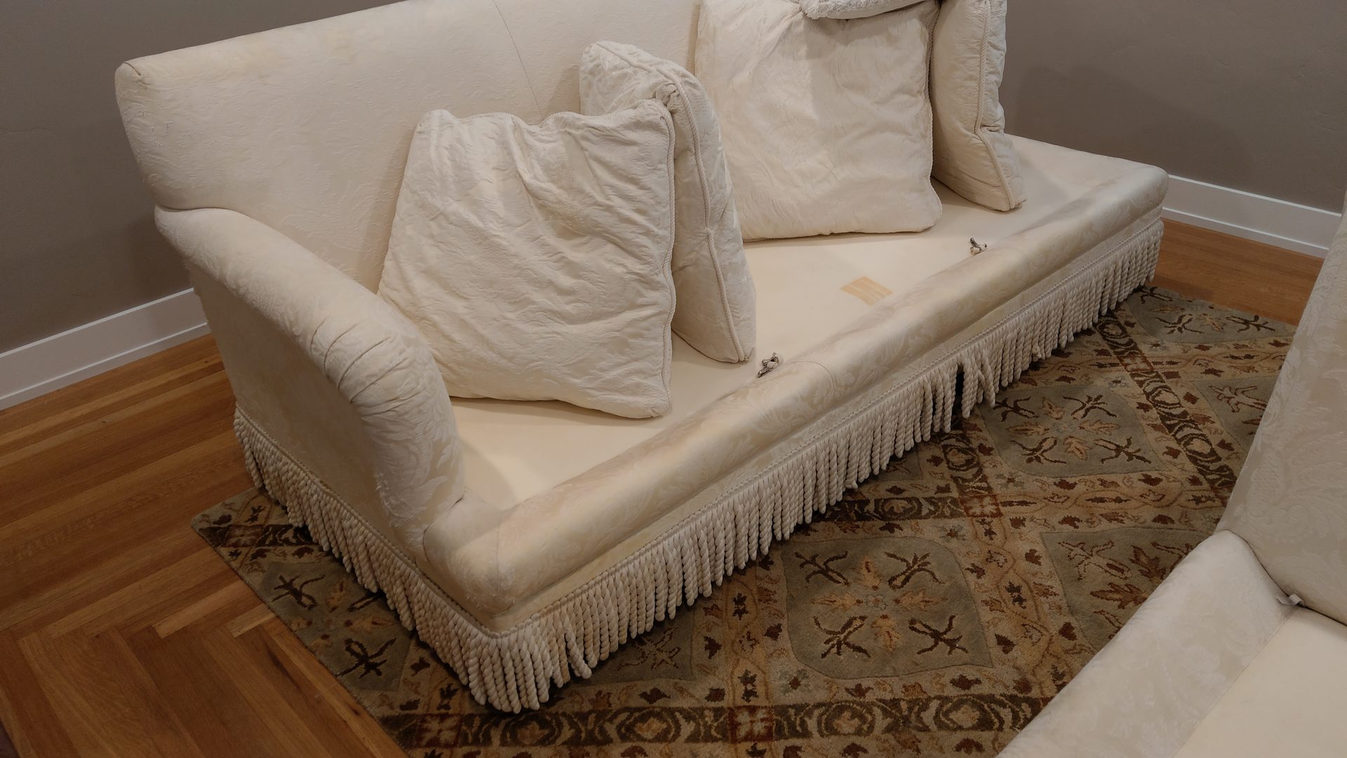 ACDC technician steam-extracting a living room carpet